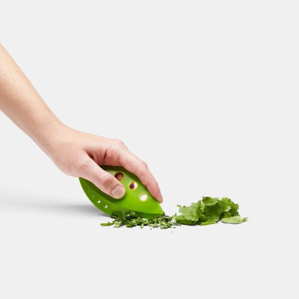 Kale and Greens Stripper cutting cilantro